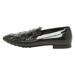 Mocasines Tod's de charol negro con flecos cortados con láser Talla 38.5