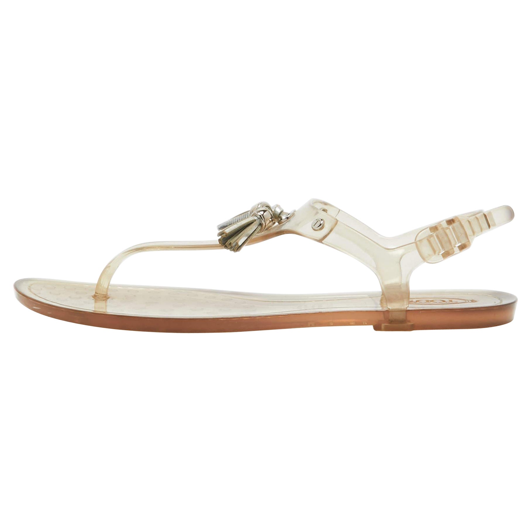 Tod's Transparente flache Zehensandalen aus Gummi mit Quaste und Schleife Größe 40 im Angebot