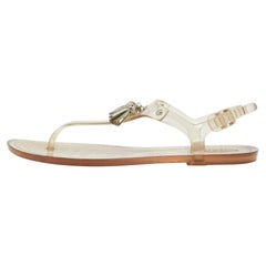 Tod's Transparente flache Zehensandalen aus Gummi mit Quaste und Schleife Größe 40