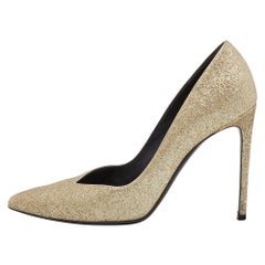 Saint Laurent Bombas con punta de purpurina dorada talla 40
