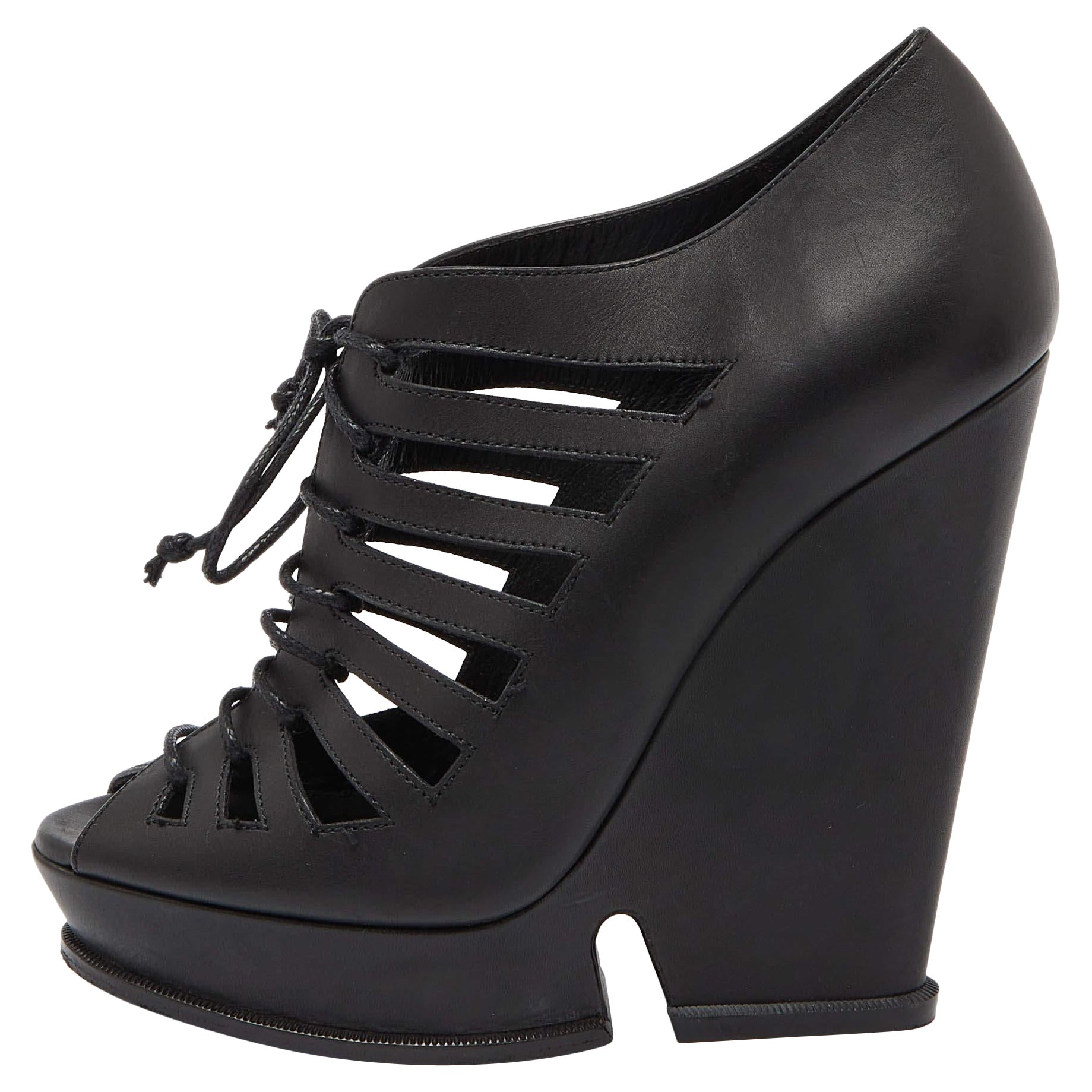 Saint Laurent Botines Hortense de cuña y plataforma en piel negra recortada Talla 38.5