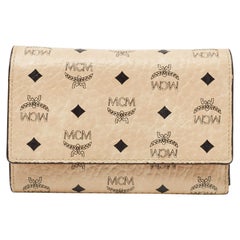 MCM Beige/Pfirsich Visetos aus beschichtetem Segeltuch und Leder  Trifold Brieftasche