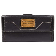 Dolce & Gabbana Schwarzes kontinentales Portemonnaie aus Leder mit Klappe
