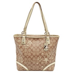 Coach Fourre-tout caractéristique en toile enduite beige/or et cuir Heritage Star