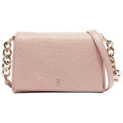 Bolso cruzado con solapa de piel rosa Aigner