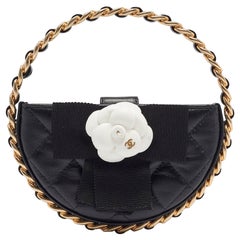 Chanel Black Quilted Leather Mini Round Camellia Clutch