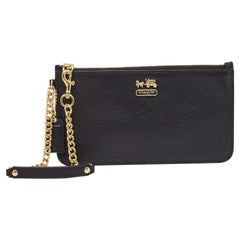 Pochette en cuir noir de Coach