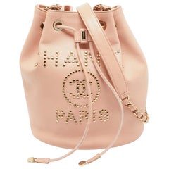 Chanel Peach Leather Logo Studs Deauville Drawstring Bucket Bag