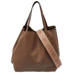 CH Carolina Herrera Brown Monogram Embossed Leather Matryoshka Tote