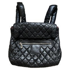 Coco Chanel Sac à dos à rabat en cuir d'agneau diamanté matelassé noir, 2009
