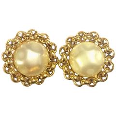 Vintage CHANEL classic simple earrings with large faux pearl and chain frames