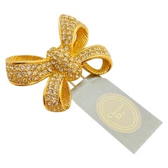 Vintage CHRISTIAN DIOR signed gold crystals designer runway bow brooch w tag
