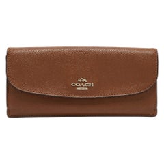 Coach - Portefeuille continental à rabat en cuir Brown