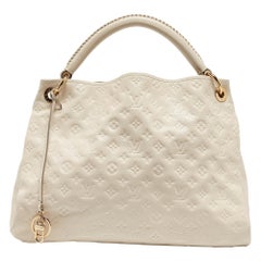 Louis Vuitton Neige Monogram Empreinte Leather Artsy MM Bag