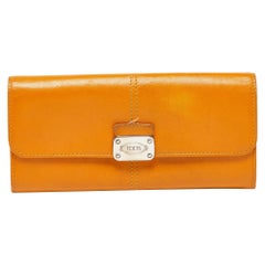 Tod's Portefeuille à rabat continental en cuir moutarde avec logo