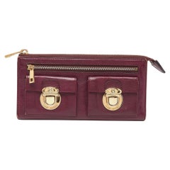 Marc Jacobs Portafoglio continentale con zip in pelle color magenta