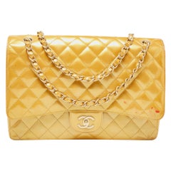 Chanel Gold Quilted Patent Leather Maxi Classic Single Flap Bag