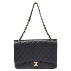 Chanel Black Quilted Caviar Leather Maxi Classic Double Flap Bag