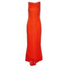 Carolina Herrera Maxivestido de seda arrugada naranja con adornos S
