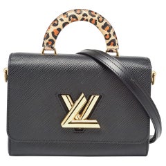 Louis Vuitton Bolso MM Twist Negro Epi Piel Corazón Salvaje