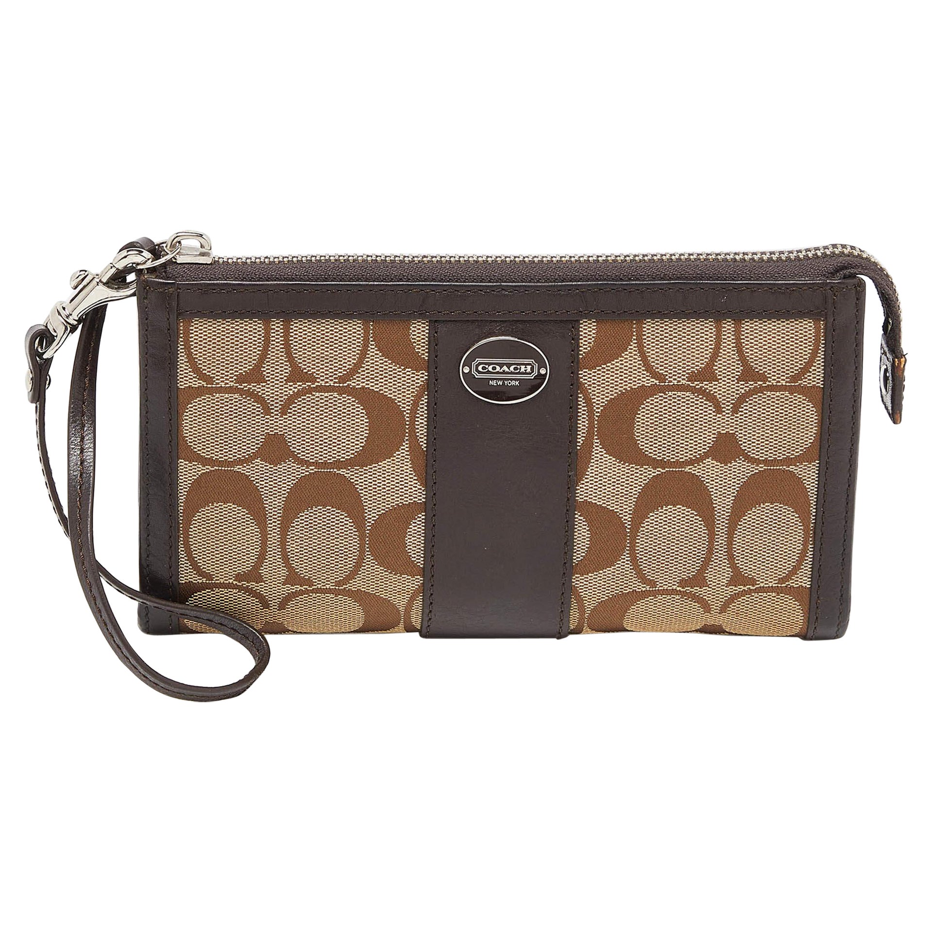 Coach Brown/Beige Signature Canvas and Leather Zip Wristlet Pouch For Sale
