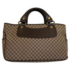 Cèline Boogie handbag in beige-brown fabric.