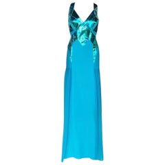 F/W 2010 Look#38 Vestido vintage Versace de seda turquesa con piel espejada 44