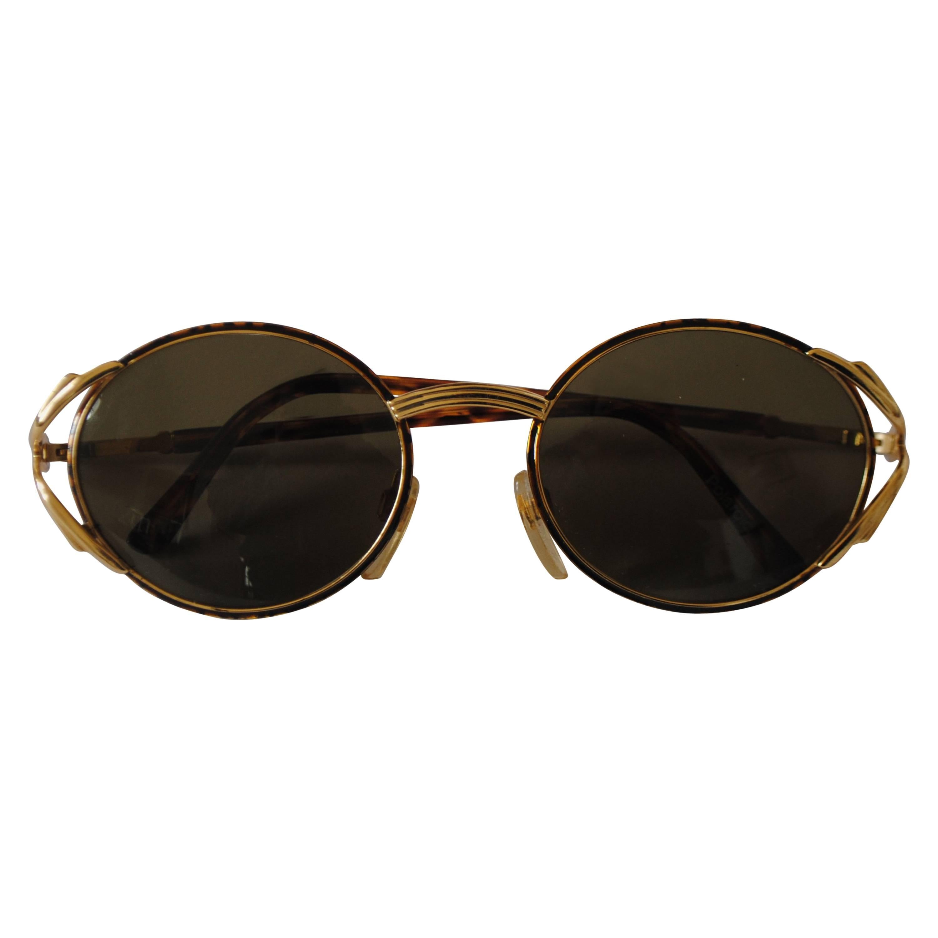 Polaroid tortoise gold hw sunglasses