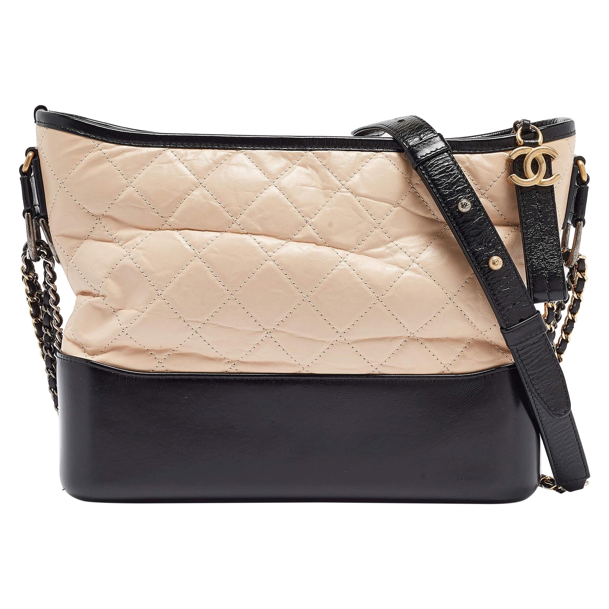 Chanel - Sac Gabrielle moyen en cuir vieilli matelassé pêche/noir