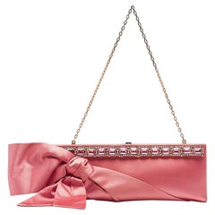 Pochette con catena con fiocco in raso rosa di Valentino