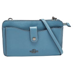 Bolso Crossbody Coach Pop Up Noa de piel azul
