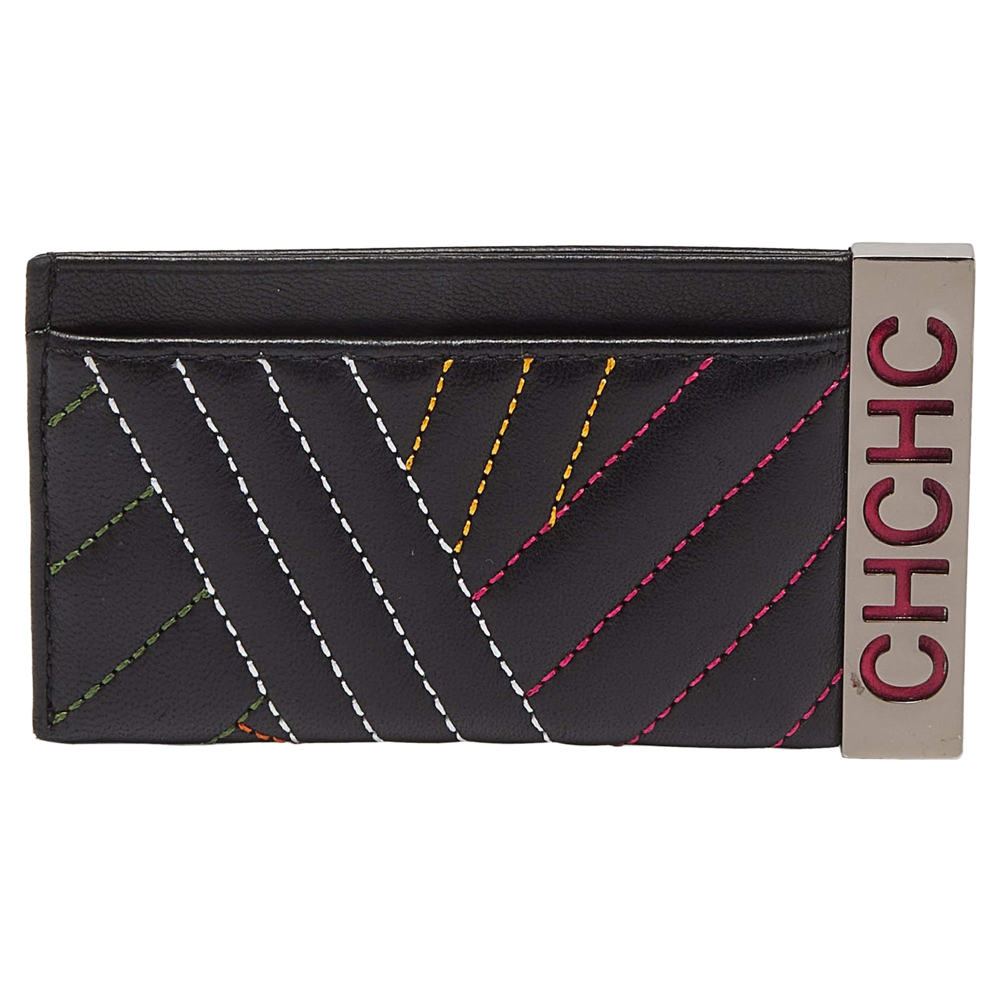 CH Carolina Herrera Porte-cartes en cuir matelassé noir