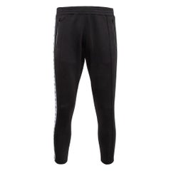 Moschino Couture Pantalones de chándal de punto elástico con logotipo negro y bandas laterales S