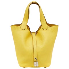 Hermes Jaune de Naples Taurillon Clemence Borsa in pelle con lucchetto Picotin 18