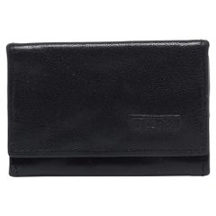 TUMI Porte-monnaie en cuir noir