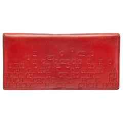 Portafoglio lungo in pelle con Monogram in rilievo rosso di Carolina Herrera