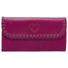 Portafoglio continentale con patta obliqua in tela e pelle rosa Dior