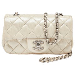 Chanel Pearl Beige Quilted Caviar Leather New Mini Classic Flap Bag