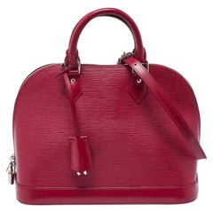 Sac Alma PM en cuir épi fuchsia Louis Vuitton