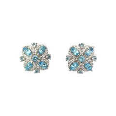 Designer Blue Topaz Halo Floral Studs Earring for Her in 925 Sterling Silver