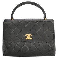 Chanel Vintage Top Handle Kelly Black Flap Bag lambskin leather 24k Gold HW
