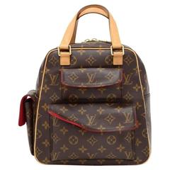 Louis Vuitton Excentri Cite Monogram Canvas Hand Bag