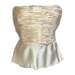 Vintage satin top by Valentino in ivory.