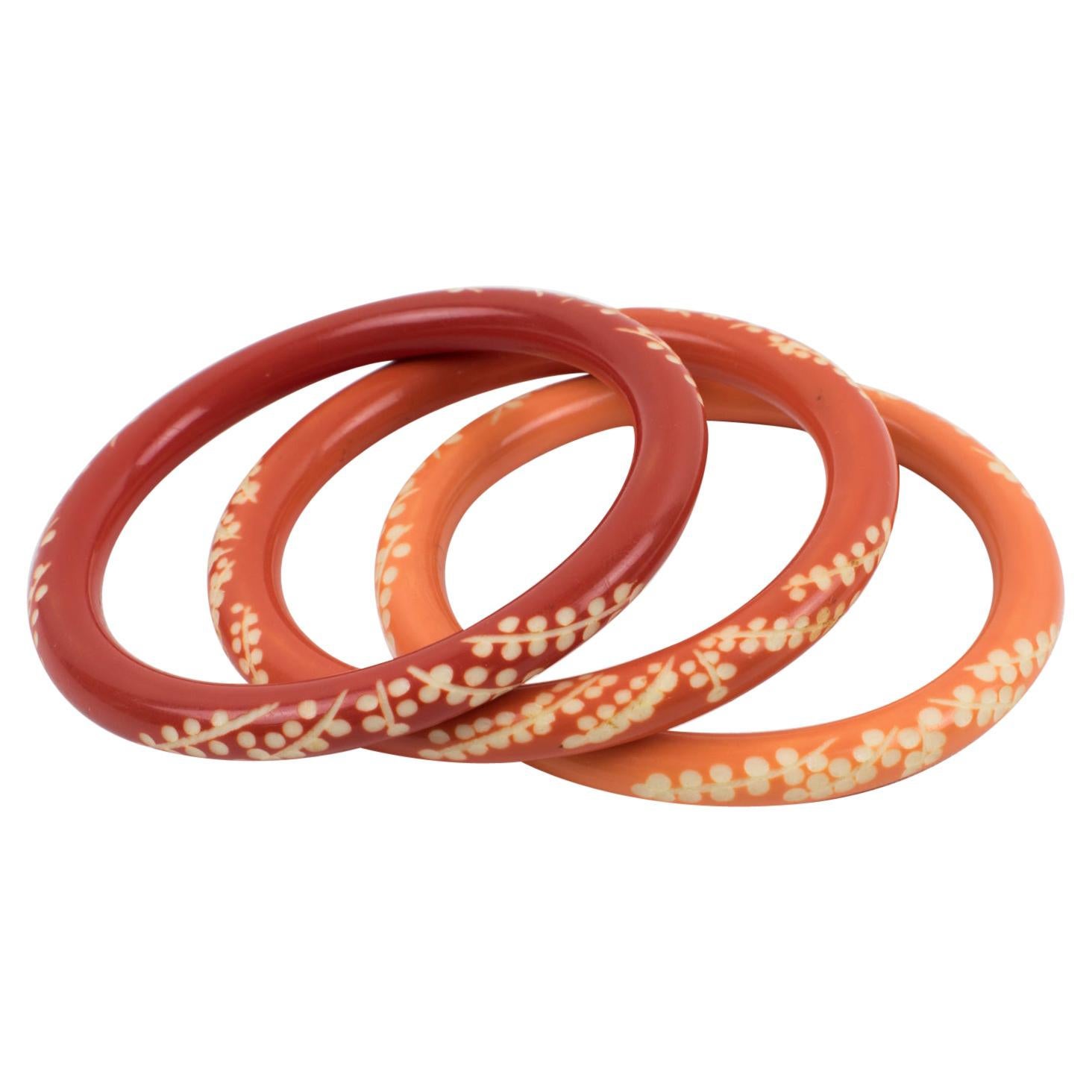 Galalith Carved Spacer Bracelet Bangle Orange Variation Trio For Sale