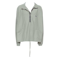 FEAR OF GOD ESSENTIALS khakifarbener Baumwoll-Nylon-Pullover mit halbem Reißverschluss und Logo L