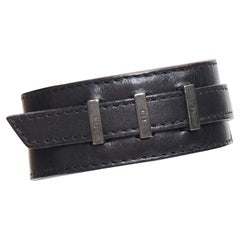 DIOR HOMME Hedi Slimane black leather CD logo loop through cuff