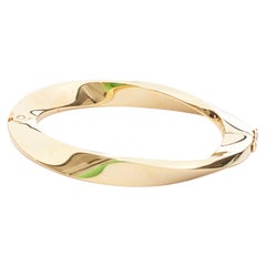 SAINT LAURENT Brazalete rígido con doble cierre de presión de oro trenzado