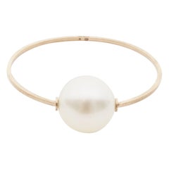 CHANEL 14S Runway Orbital large XL pearl CC logo gold metal bangle M