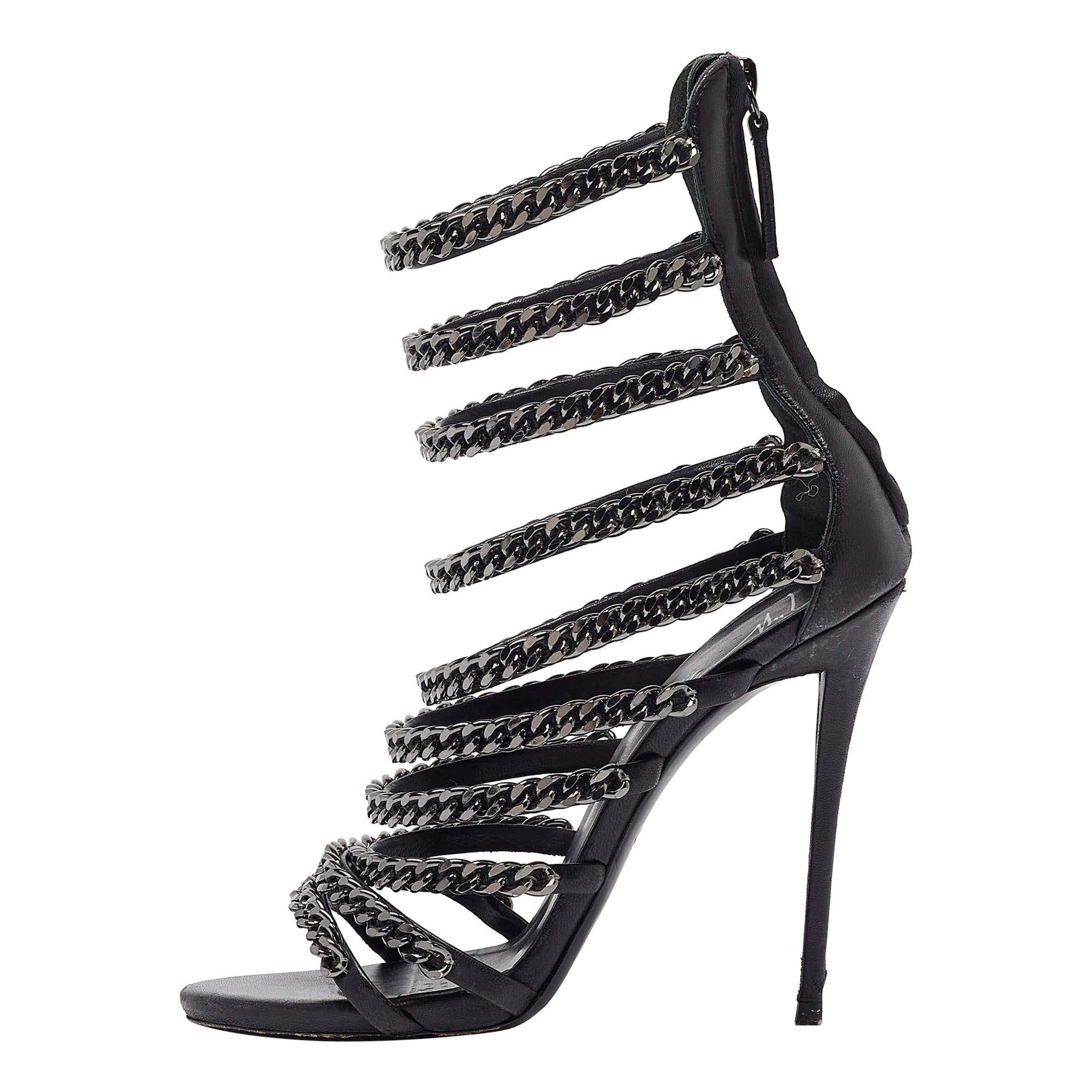 Giuseppe Zanotti Schwarze Riemchensandalen aus Leder und Kette Größe 37,5