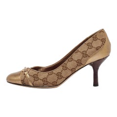 Gucci Metallic/Beige GG Canvas And Leather Bow Cap Toe Pumps Size 37